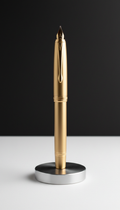 Gilded bronze collector's pen with minimalist packaging